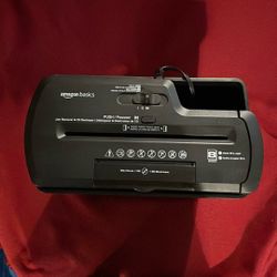 Amazon Basics 8 Page Shredder.  $15. Never Used