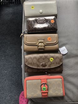 Coach and mk wallets