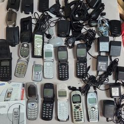 Various cell phones (12), One Beeper & multiple charges