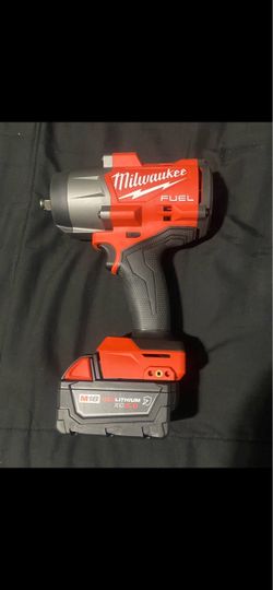 Milwaukee M18 FUEL 18V Lithium Ion Brushless Cordless 1/2in Impact Wrench with Friction Ring w/XC Resistant 5.0ah Battery