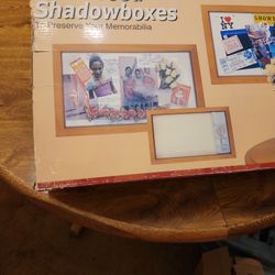 Two solid wood, hinged doors, padded muslin fabric  backing. Magnetic Closure, Includes Pins, Tags, String & Double Sided Foam Tape