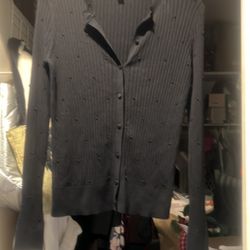 Elegant ribbed black lightweight long sleeve cardigan with button closure. Ideal for versatile styling. Size S new no tags