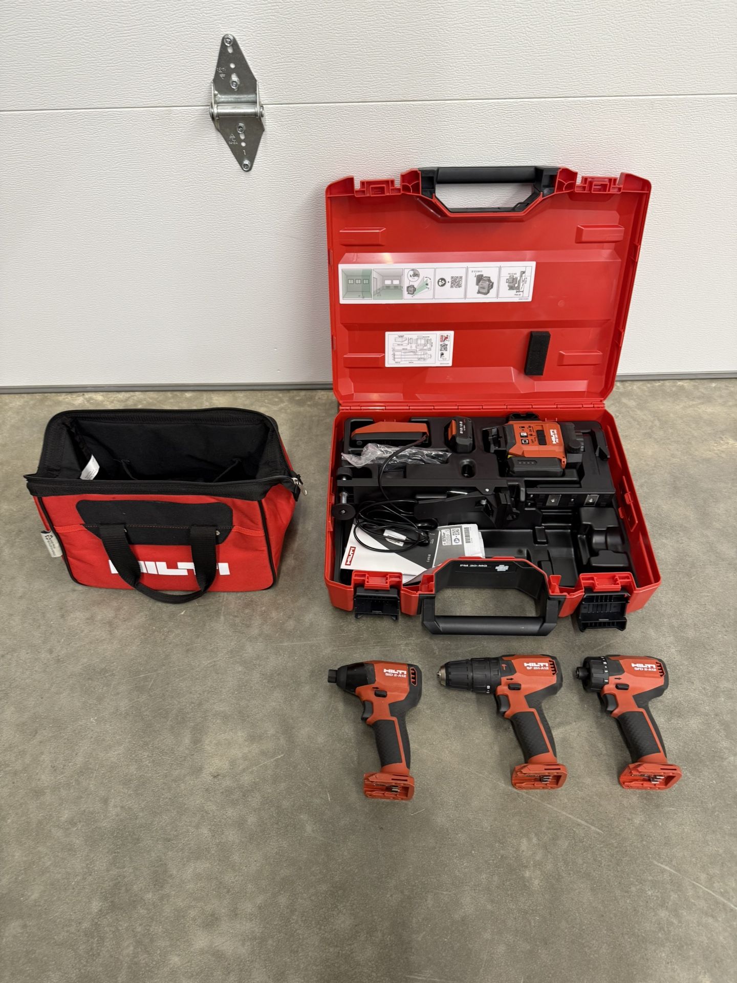 Hilti PM 30-MG 12-Volt Multi-Green Line Laser 131 ft. with Bracket, Target Plate, Battery, Charger and Case Comes with one extra battery and three dif