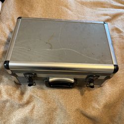 CASE, METAL  16"w x 10"deep x 7"high; cross streets are Arapaho & Waterview 