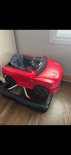 Red convertible car walker