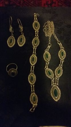 Silver set with green stone