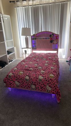 Twin pink bed with mattress