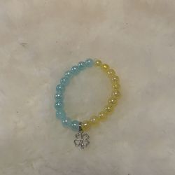 Light Blue And Yellow Beaded Bracelet With Charm