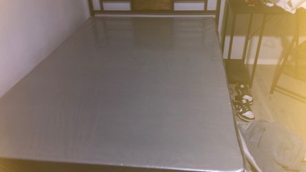 Wooden frame for the bed