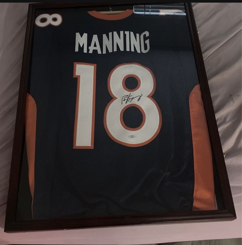 Framed Peyton Manning signed jersey