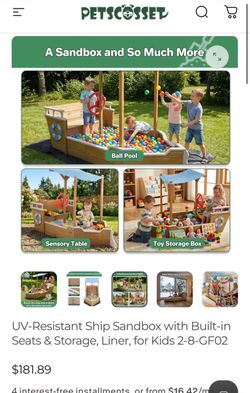 Wooden sandbox with canopy