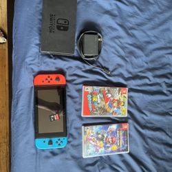 Nintendo Switch w/ Dock + 3 Games