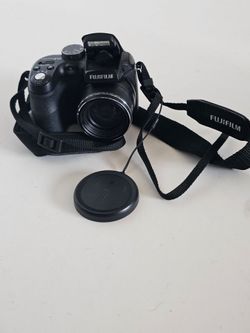Fujifilm  Camera with compact bag, sd card, and cords