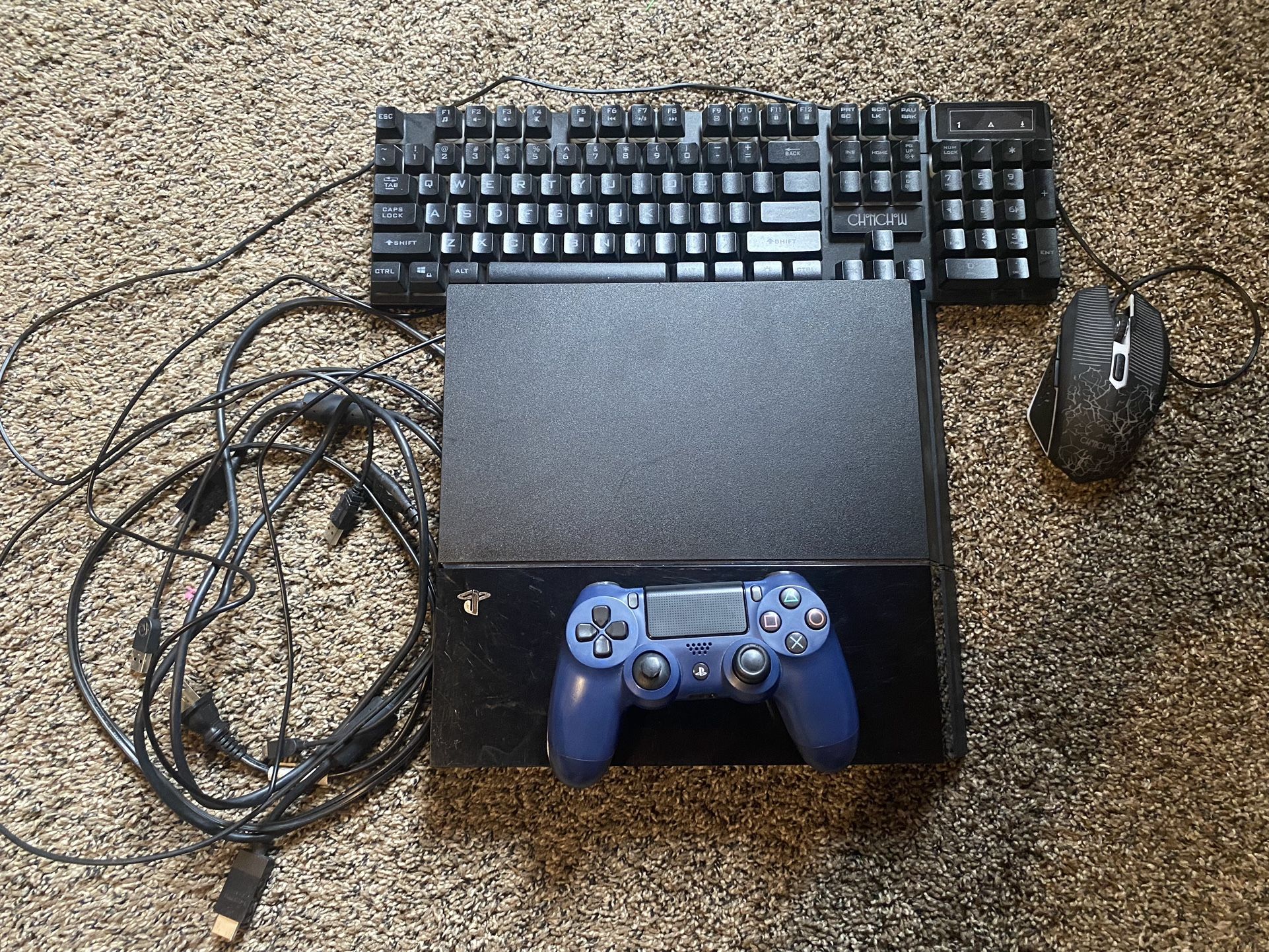 PS4 with games/dual shock controller and nearly new keyboard. All wires also included.