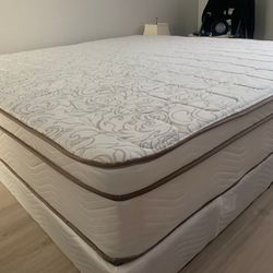 New king mattress and box springs bed frame is not included