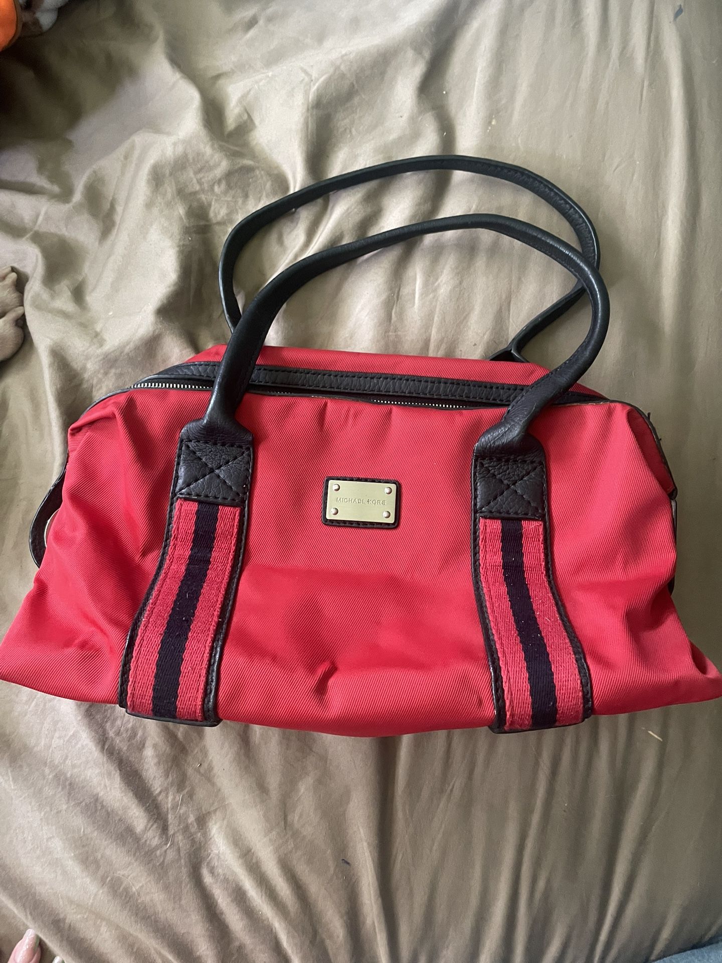 Michael Kors, Red with black trim and silver hardware, medium size purse