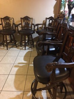 Ashley Furniture North Shore Dark Brown Tall Upholstered Swivel Barstool