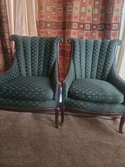 Two armed chairs