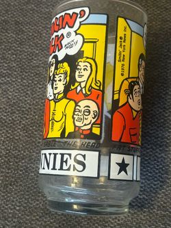 10 vintage 1976 Libbey "The Sunday Funnies" collector glass featuring the Smilin' Jack comic strip.