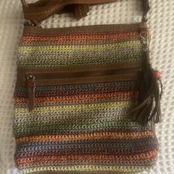Multi-coloured crochet crossbody bag with leather strap and tassel #crochetbag