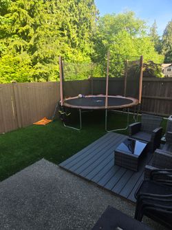 Free 12' trampoline with enclosure