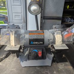 Like new Delta 6-in variable speed bench grinder with grinding wheel and polishing wheel and shop light.  In excellent condition. Need to make room in