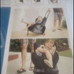 Carrito para cargar el asiento del bebe solo  una de uso $35