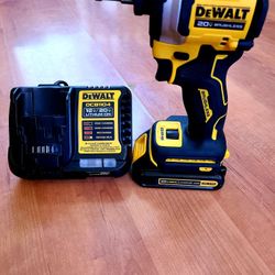 ~BRUSHLESS ATOMIC DEWALT IMPACT DRILL TOOL SET WITH BATTERY AND CHARGER SIMI-NEW IN EXCELLENT WORKING CONDITION~