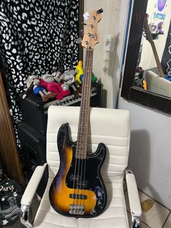 Squire p bass electric guitar sunburst