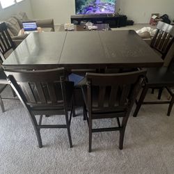 Dark brown dining table set