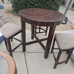 Table And Three Chairs 
