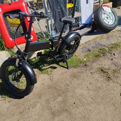 Brand New folding E-Bike only in white left selling for $$700