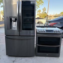 Lg Stove And Fridge Black Stainless Both Work Perfect In Great Condition Free Delivered To Your Garage