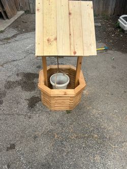 Hand made wooden wishing well