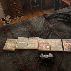 7 Games + PS3 Controller. 