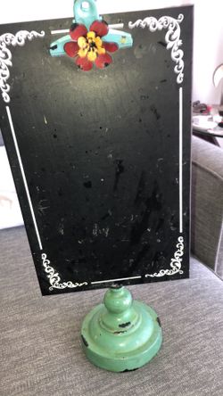 Shabby distressed chalkboard with note clip
