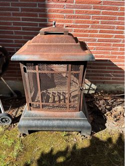 Outdoor wood-burning fireplace