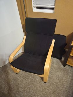 Black chair with footstool