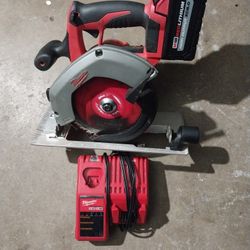 Milwaukee Circular Saw with Left Side Blade 6 - 1/2"  Saw  is Lilibit Used Barry  8 AH  Charger  are  Brand New  