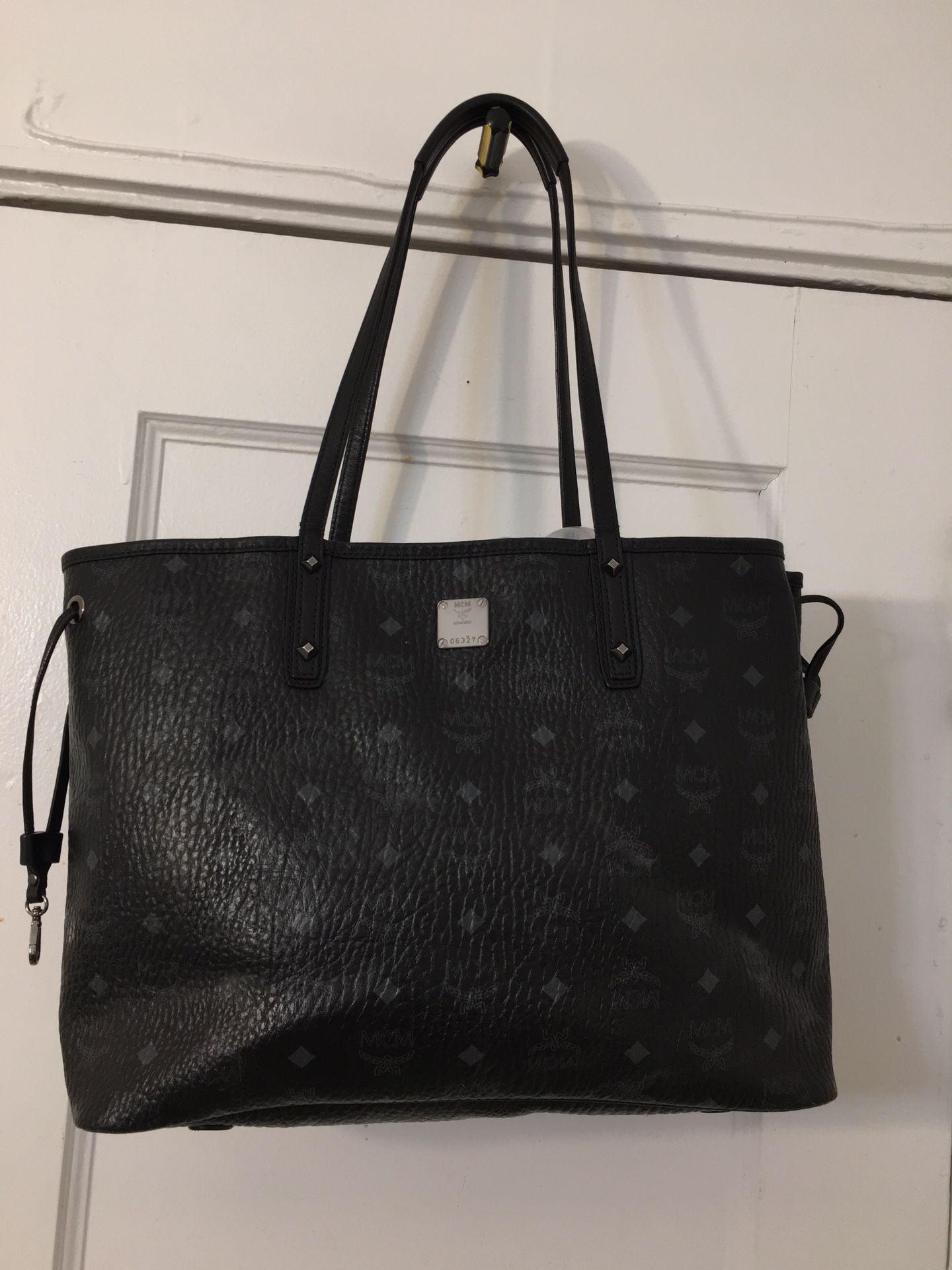 MCM Black Leather Tote Bag. Dimensions 14x17. Top measurement 17” and Bottom 14”