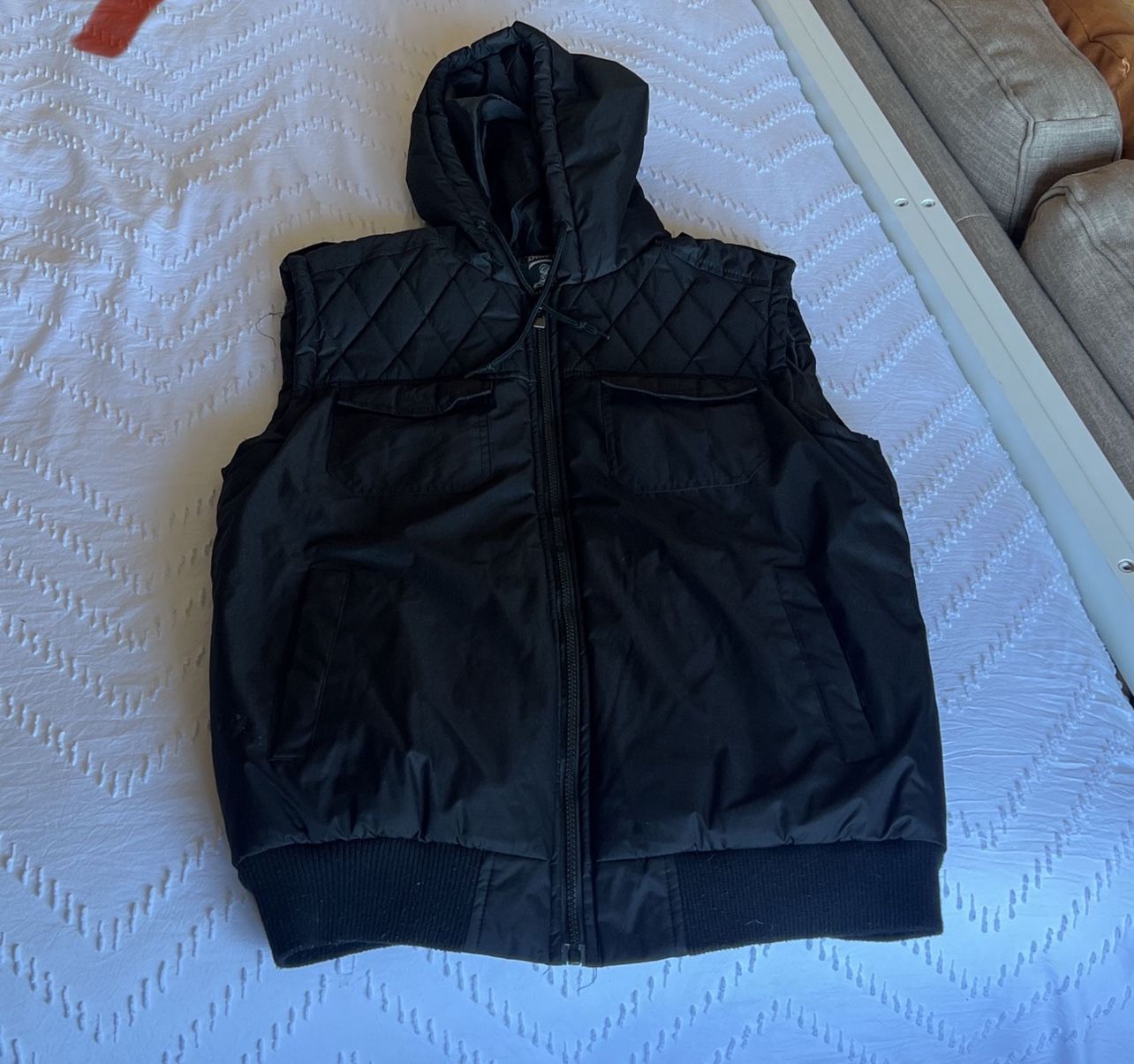 Men’s blue gear medium puffer vest. 