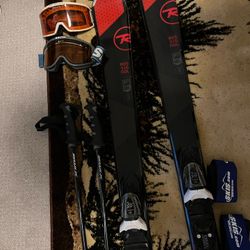 Rossignol Experience 75 skis with bindings + Carbon Excalibur poles + Smith & Uvex goggles. Great beginner/intermediate setup. Ready to ski. $225 OBO.
