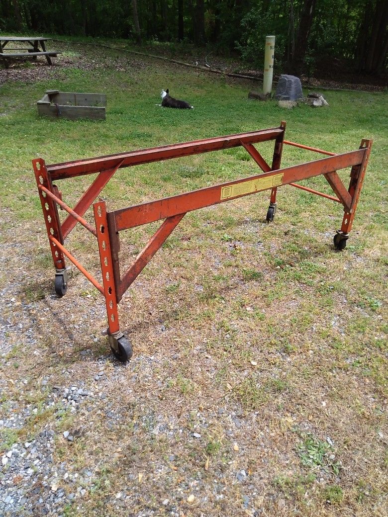 ROLLING WORK PLATFORM. SCAFFOLDING GREAT SAW TABLE. WORK ON 8 TO 9. FOOT CEILING S
