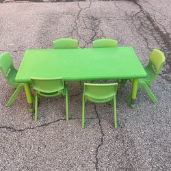Green daycare table w/ 6 Chairs 