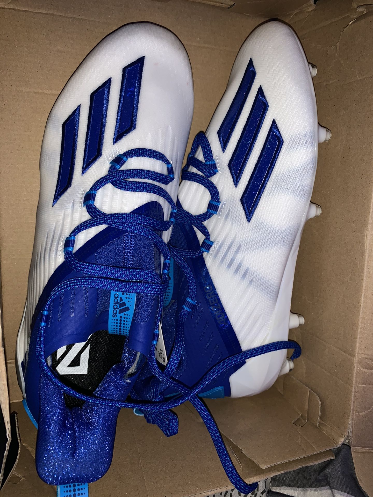 Adizero new reign football cleats