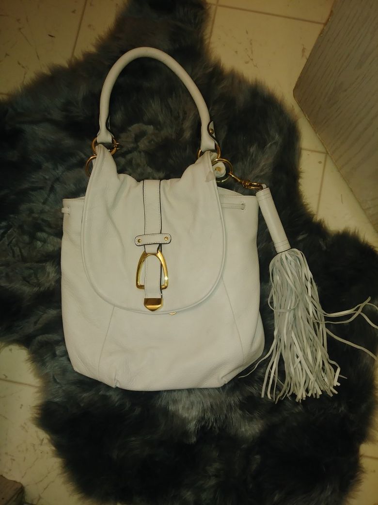 White G.I.L.I purse w/ removable tassle. 40$ i paid 190 for it off qvc.