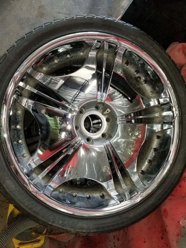 Set of 4 24" rims and tires