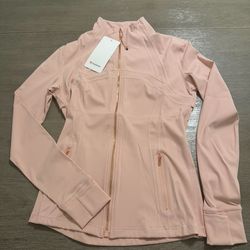 TAKE THESE BLACK AND PINK LULULEMON JACKET FOR 55$ EACH
