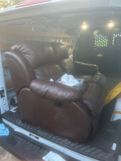 Twin seats Leather reclining sofa (send an offer)