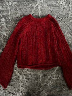 Red knitted sweater